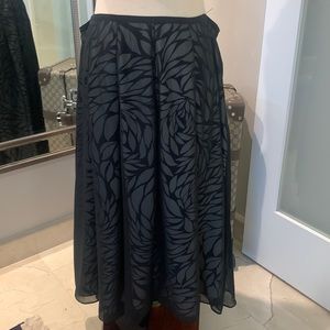 Flowy skirt with sheer overlay